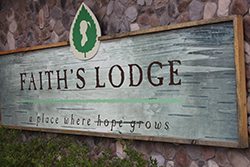 the sign at Faith's Lodge