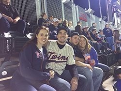 Patrick and Nicole attend a Twins game with co-workers