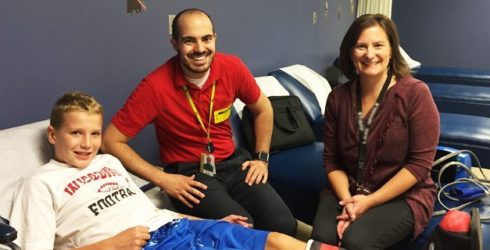 PHS infusion nurse trains providers at his old middle school