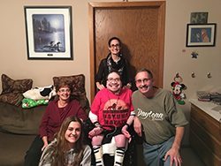 Denise with her family, includingher medically complex son