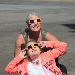 Tana and Jill view the solar eclipse